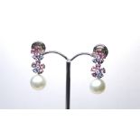 SCHOEFFEL, A PAIR OF 18CT WHITE GOLD, PEARL AND GEM SET EARRINGS Two gem set daisy clusters with a
