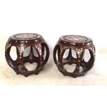 A PAIR OF CHINESE ROSEWOOD AND MOTHER OF PEARL INLAID BARREL STOOLS Decorated with flowers and