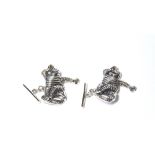 A PAIR OF SILVER NOVELTY FIGURAL CUFFLINKS Modelled as a Michelin man. (approx 2.5cm) (weight approx