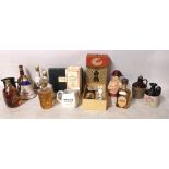 A BOXED BOTTLE OF FAMOUS GROUSE HIGHLAND DECANTER Along with six miniature classic malts, boxed