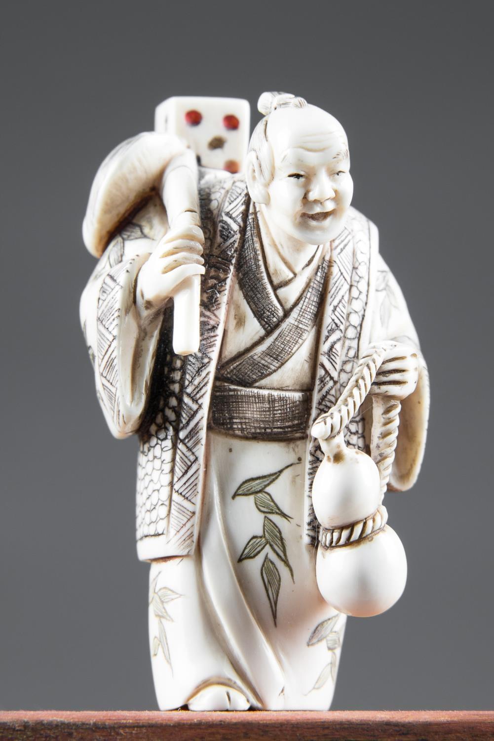 A FINE 19TH CENTURY 'FOUR EVILS' JAPANESE NETSUKE IVORY CARVING OF WINE, WOMEN, GAMBLING AND SONG