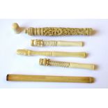A COLLECTION OF 19TH CENTURY CHINESE IVORY Comprising four cigarette holders, a needle case and