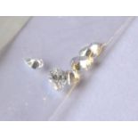 A COLLECTION OF THREE LOOSE PEAR CUT DIAMONDS. (approx 4mm x 3mm, in bag stating 0.27ct weight per