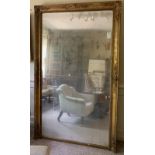 A LARGE EARLY 19TH CENTURY FRENCH REGENCY PERIOD GILTWOOD AND GESSO PIER MIRROR Decorated with