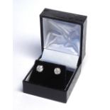 A PAIR OF 18K WHITE GOLD AND DIAMOND STUD EARRINGS. (1.84ct) Colour 1 S2 Cloudy