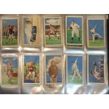 TWO ALBUMS OF EARLY 20TH CENTURY CIGARETTE CARDS To include Players, Sea Fishes, Wills Overseas,