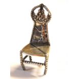 A 19TH CENTURY DUTCH SILVER MINIATURE CHAIR Having an embossed design if a fisherman and pierced
