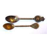 A BRASS COMMEMORATIVE SPOON, INSCRIBED TITANIC, 1912 Along with a silver plated George VI and