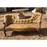 A VICTORIAN ROSEWOOD DOUBLE SPOONBACK SETTEE In floral green fabric button back upholstery and
