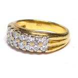 AN 18CT GOLD RING SET WITH DOUBLE ROW DIAMONDS (size L). (weight approx 6)