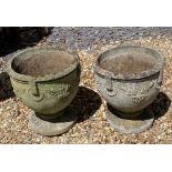 A PAIR OF EARLY 20TH CENTURY THROWN STONE GARDEN URNS Classical design. (51cm)