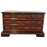 AN 18TH CENTURY GERMAN WALNUT AND FRUITWOOD COMMODE With ebony banding, the star inlaid top above