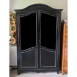 A 20TH CENTURY EBONISED DISPLAY CABINET With domed top, half glazed doors. (120cm x 60cm x 180cm)