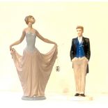 COALPORT, A STATUE OF PRINCE WILLIAM Along with a Lladro figure of a maiden. (largest 31.5cm)