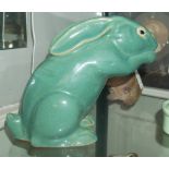 A FRENCH ART DECO GREEN GLAZED STATUE OF A RABBIT. (20cm)