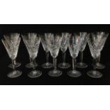GLENEAGLES, A SET OF ELEVEN CUT LEAD CRYSTAL RED WINE GLASSES Trumpet form with leaf design cuts and