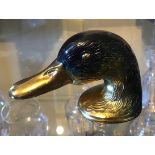 A FRENCH PAINTED BRASS FIGURAL BOTTLE OPENER IN THE FORM OF A DUCKS HEAD (8cm)