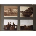 TWO EARLY 20TH CENTURY PHOTOGRAPH ALBUMS Comprising an album containing Continental views and