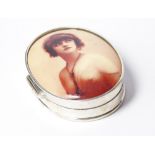 A SILVER AND ENAMEL NOVELTY OVAL PILL BOX With erotic enamel portrait to lid. (approx 5.5cm x