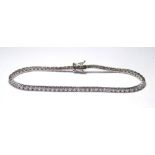 WITHDRAWN A PLATINUM AND DIAMOND BRACELET. (diamond weight 3.01ct round brilliants) (19cm) weight