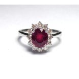 AN 18K WHITE GOLD RING SET WITH A 2.27CT RUBY Surrounded by 0.60ct diamonds (size N). weight