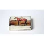 A SILVER AND ENAMEL NOVELTY PILL BOX Decorated with a racehorse and jockey. (approx 5cm x 4cm) (