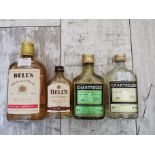 FOUR BOTTLES OF VINTAGE WHISKEY Comprising of Bell's 37cl and 10cl and two Chartreuse 20cl.