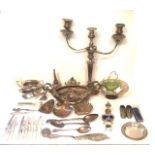 A COLLECTION OF 19TH CENTURY AND LATER SILVER PLATED WARE Comprising a three branch candelabra,
