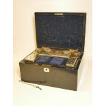 A 19th CENTURY COROMANDEL DRESSING BOX, having a blue velvet lined fitted interior, glass vanity