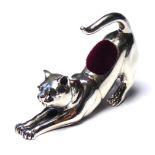 A STERLING SILVER NOVELTY CAT FORM PIN CUSHION Stretching pose with red cushion. (approx 4.5cm x