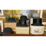 TWO MOLE SKIN TOP HATS A grey top hat and three bowler hats.