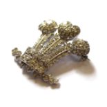 AN UNUSUAL WHITE METAL AND DIAMOND PRINCE OF WALES FEATHERS BROOCH The arrangement of diamonds
