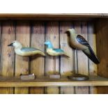 A COLLECTION OF THREE EARLY 20TH CENTURY FOLK ART CARVED WOODEN BIRDS Two being painted pale blue