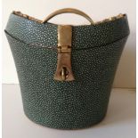 A 20TH CENTURY FAUX SHAGREEN AND BRASS BOUND CURVED BOX Applied with brass strap handle and lock. (