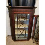 A 19TH CENTURY MAHOGANY AND SATIN WOOD STRING INLAID CORNER CUPBOARD With astral glazed door. (w