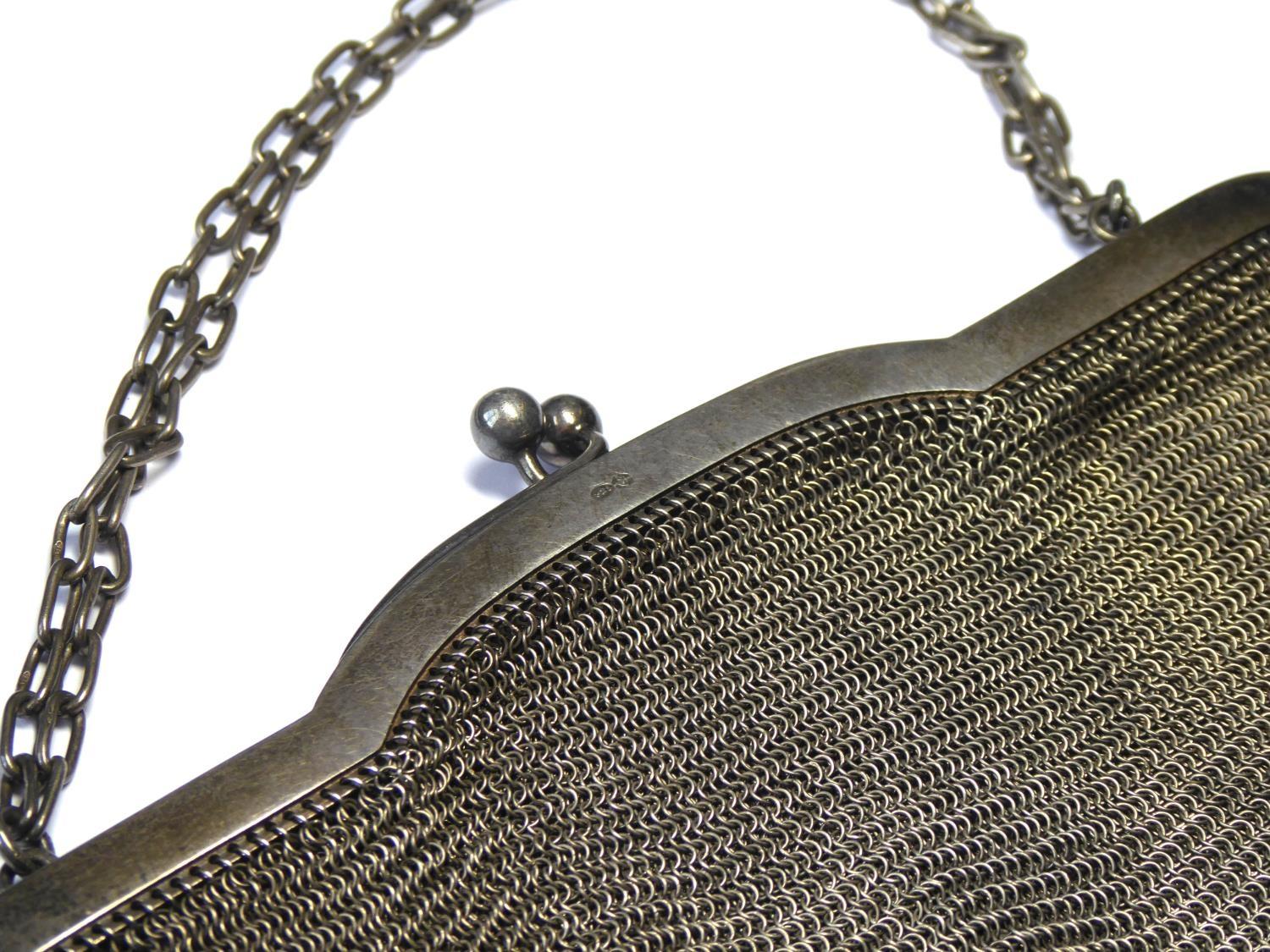 AN EARLY 20TH CENTURY SILVER MESH PURSE Having a carry chain and solid frame, import marks '. - Image 3 of 3