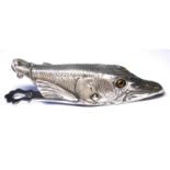 A SILVER PLATED LETTER CLIP IN THE FORM OF A PIKE FISH Having glass set eyes with hinged back. (