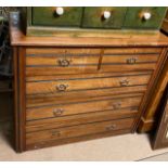 AN EDWARDIAN SATIN WALNUT CHEST With two short above three long drawers. (96cm x 47cm x 102cm)