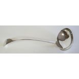 A VICTORIAN SILVER SOUP LADLE Plain form with engraved family crest, hallmarked Sheffield, 1900. (