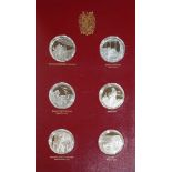 A CASED SET OF SILVER CHURCHILL CENTENARY MEDALLIONS Twenty-four proof silver coins in a fitted