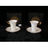 VERSACE FOR ROSENTHAL, A PAIR OF COFFEE CUPS AND SAUCERS Medallion meandre D'or, Boxed as new.