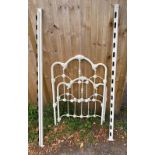 A VICTORIAN STYLE PAINTED IRON SINGLE BEDSTEAD.