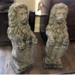 A PAIR OF EARLY 20TH CENTURY RECONSTITUTED STONE HERALDIC LIONS. (81cm)