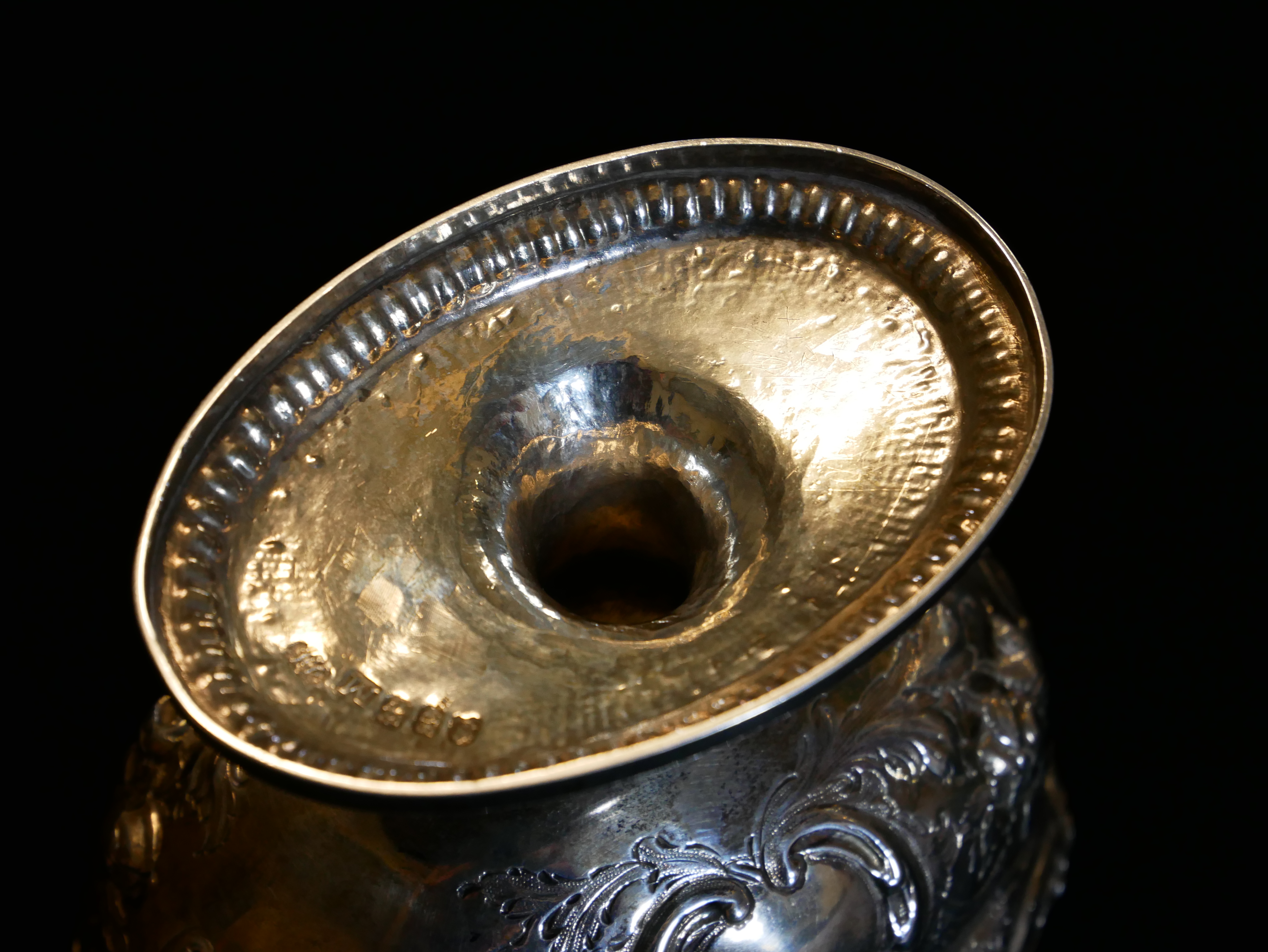 A GEORGIAN IRISH SILVER SWEETMEAT BASKET Having a swing handle, embossed floral decoration and - Image 4 of 5