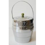 ALVAR ALTO,FINNISH,AN ART DECO CHROME AND BAKELITE ICE BUCKET,having a swing handle,carved green