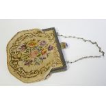 AN EDWARDIAN GILT METAL, LAPIS LAZULI AND NEEDLEPOINT PURSE Cabochon cut stone set to clasp,with