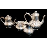 AN EARLY 20TH CENTURY MATCHED SILVER PLATED FOUR PIECE TEA AND COFFEE SERVICE Comprising a teapot,