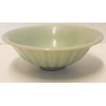 A CHINESE LONGQUAN, SOUTHERN SONG DYNASTY, 1127 - 1279, CELADON CONICAL FORM BOWL With flutes