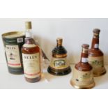 A COLLECTION OF BELLS VINTAGE WHISKEY Comprising of a 1990 Christmas edition stoneware bottle with