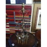 A 19th CENTURY BRASS TABLE LAMP,scrolled Gothic form on shaped base. Approx 55cm.